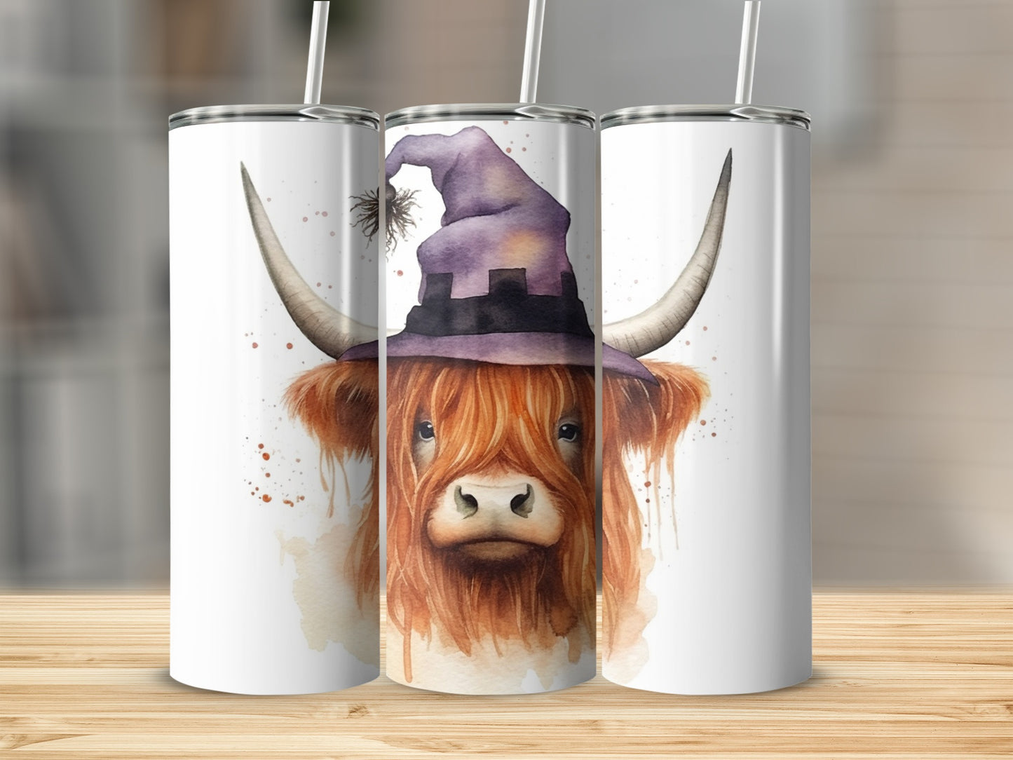 Highland cow wearing a purple witch hat on a white tumbler.