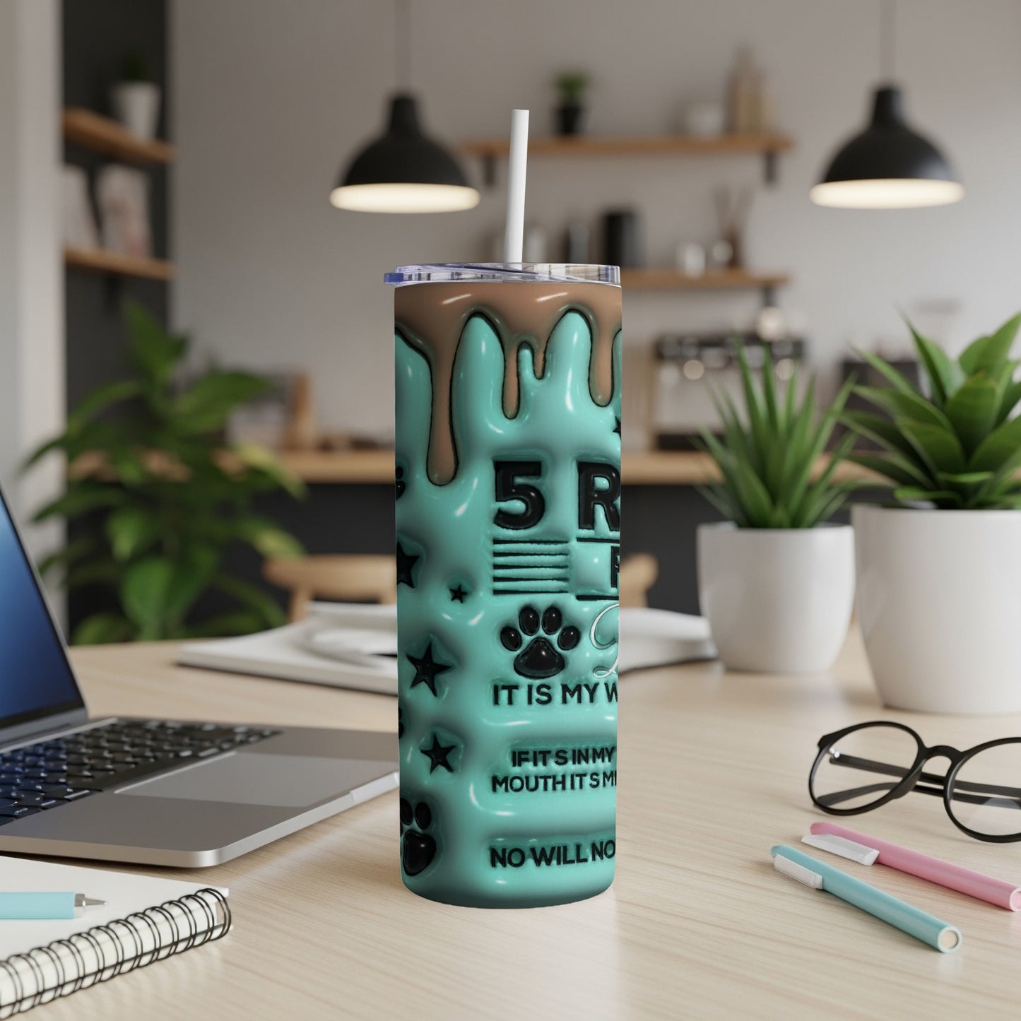 Turquoise tumbler with chocolate drip design and paw prints, "5 R" text.