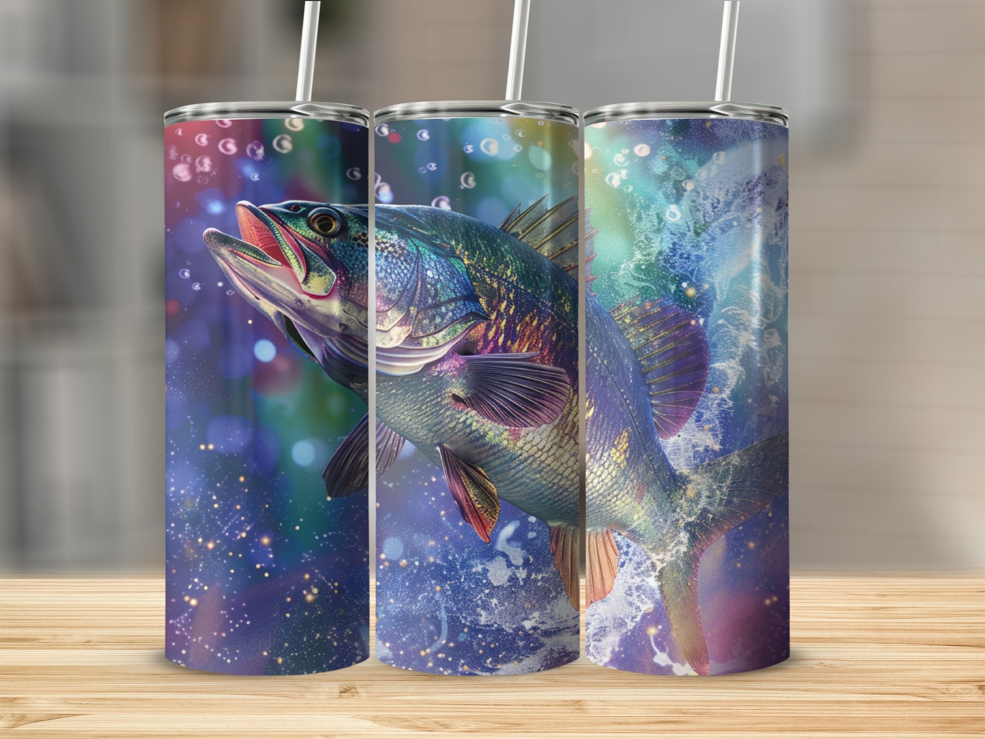 Three tumblers with colorful fish leaping out of water and bubbles.