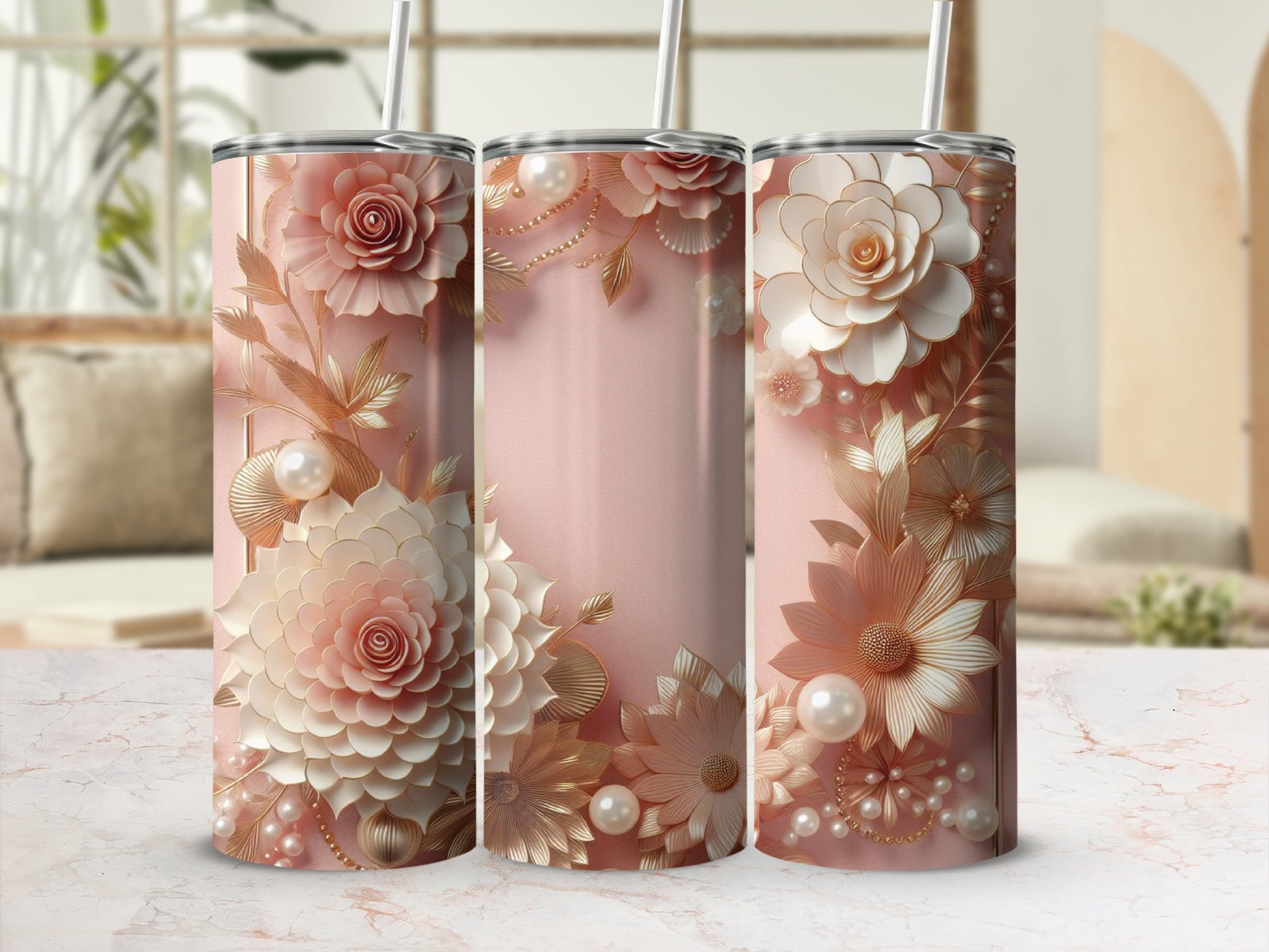 Three rose gold tumblers with floral and pearl embellishments.