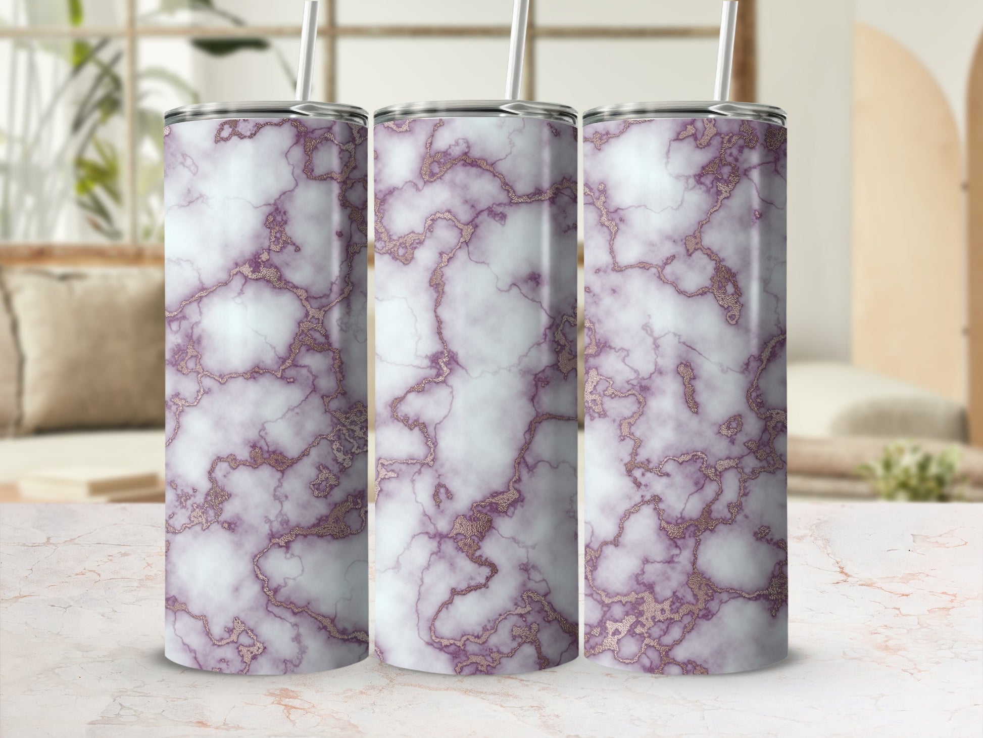 Three tall tumblers with a white and purple marble pattern and gold veining.