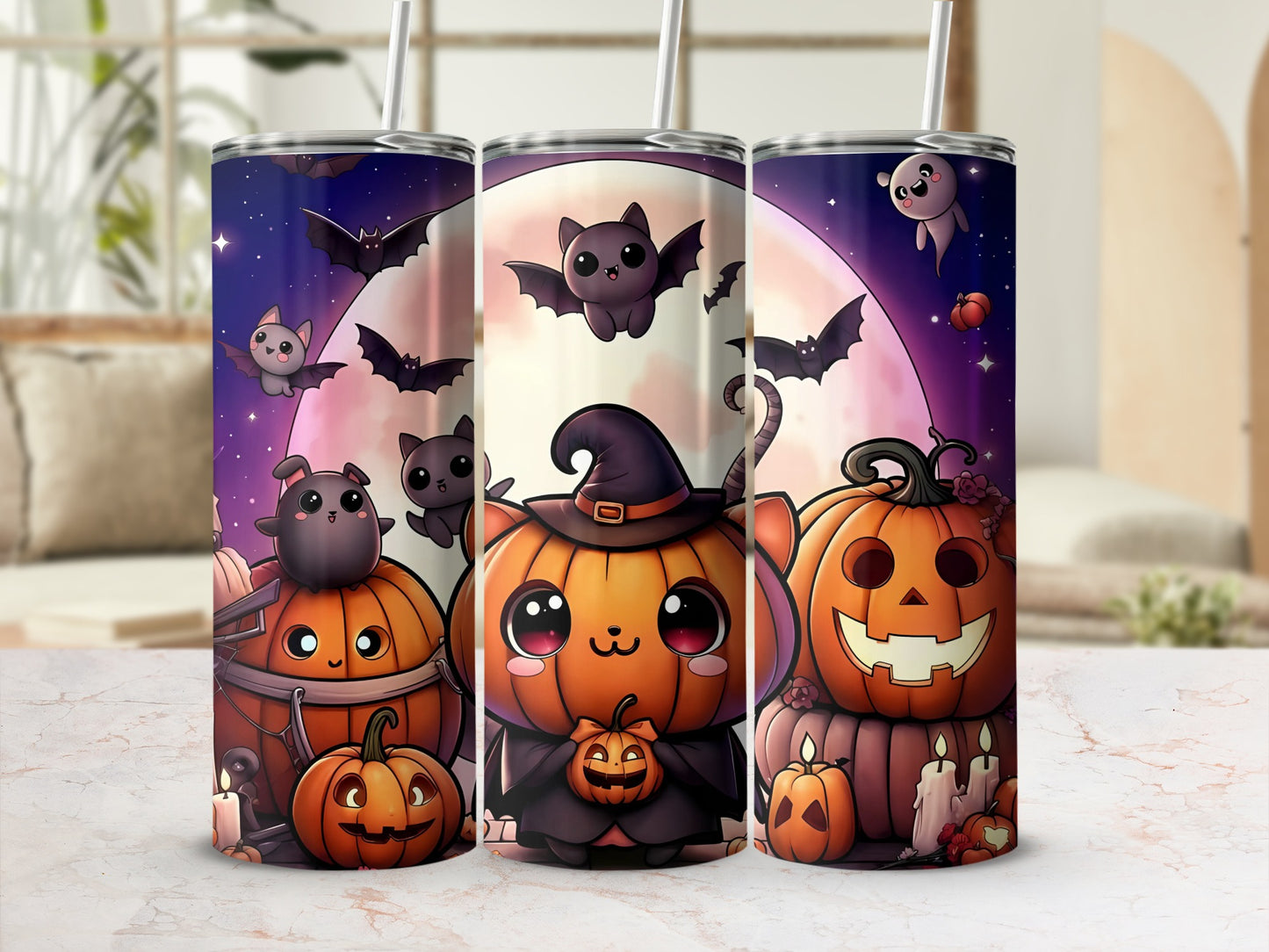 Three tumblers with cute Halloween designs featuring pumpkins, bats, ghosts, and a full moon.