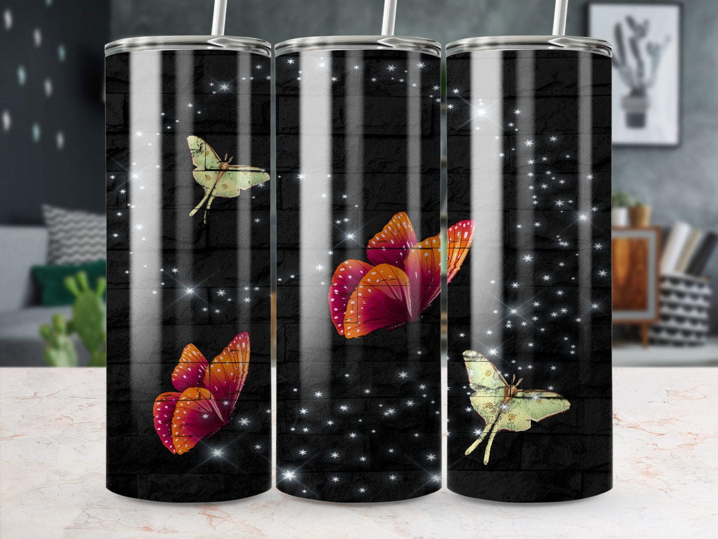 Black tumbler with three iridescent butterflies and sparkling stars.