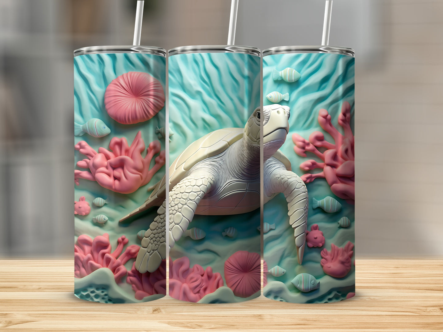 Three tumblers with a sea turtle and coral reef design.
