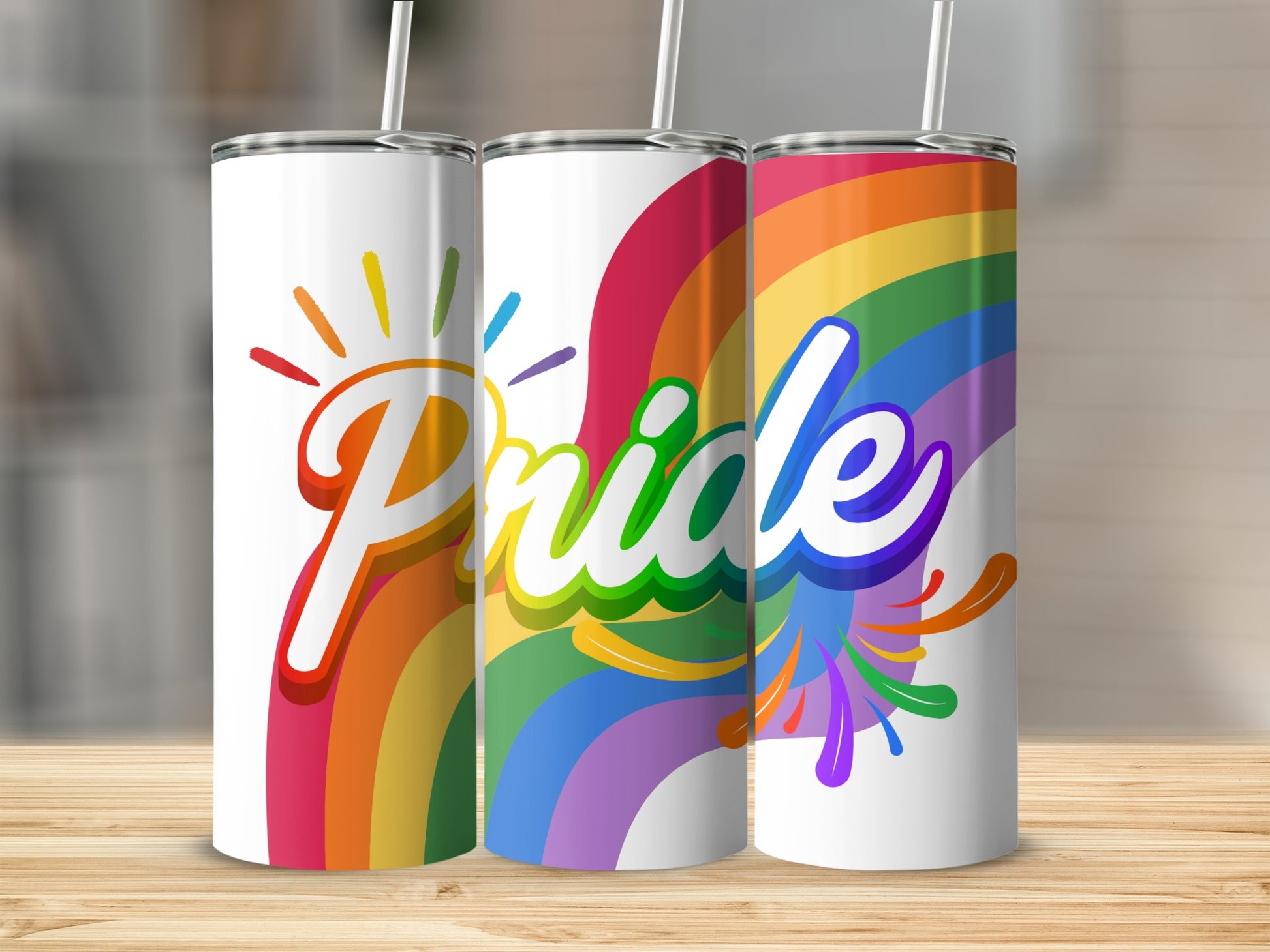Pride rainbow tumbler with sunburst and paint splatters.