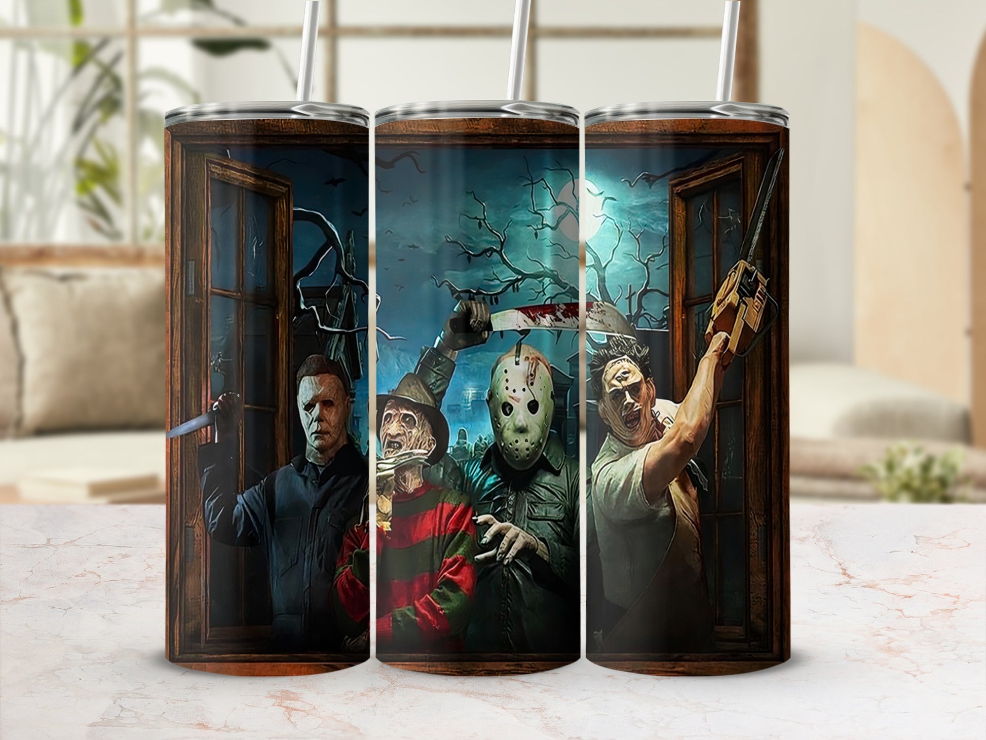 Three horror movie icons, Michael Myers, Freddy Krueger, and Leatherface, on a tumbler.