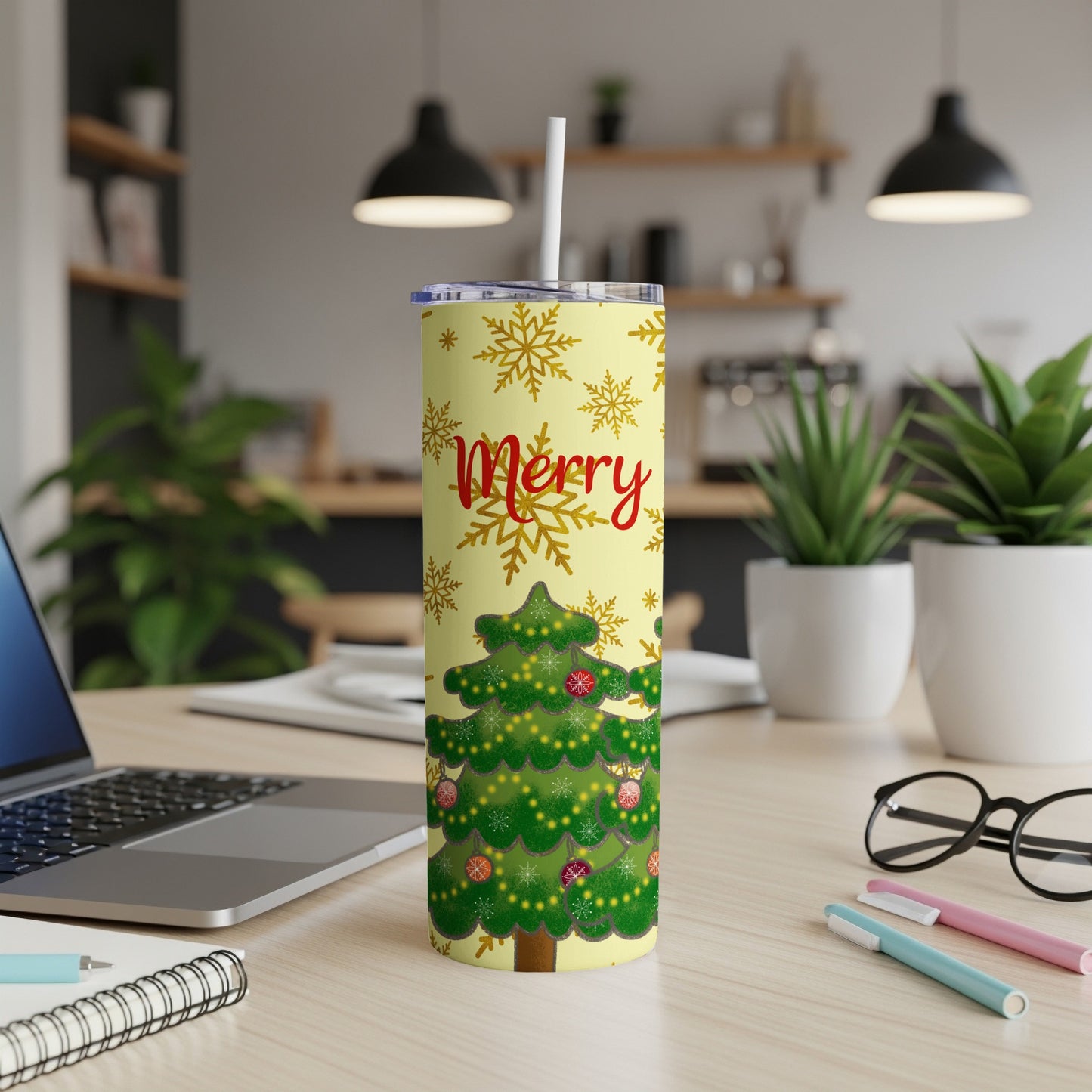 Yellow tumbler with Christmas tree, ornaments, snowflakes, and "Merry" text.
