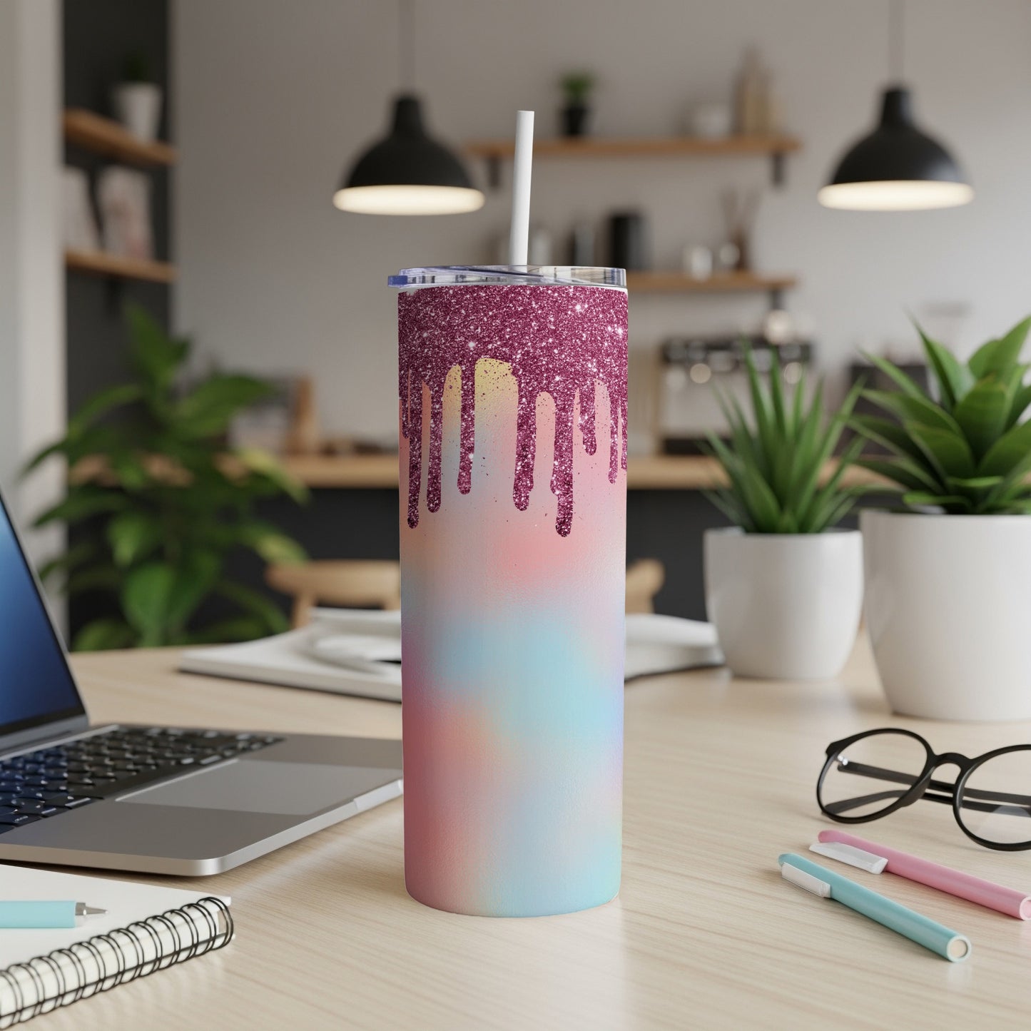 Glitter drip tumbler with pastel tie-dye design and white straw.
