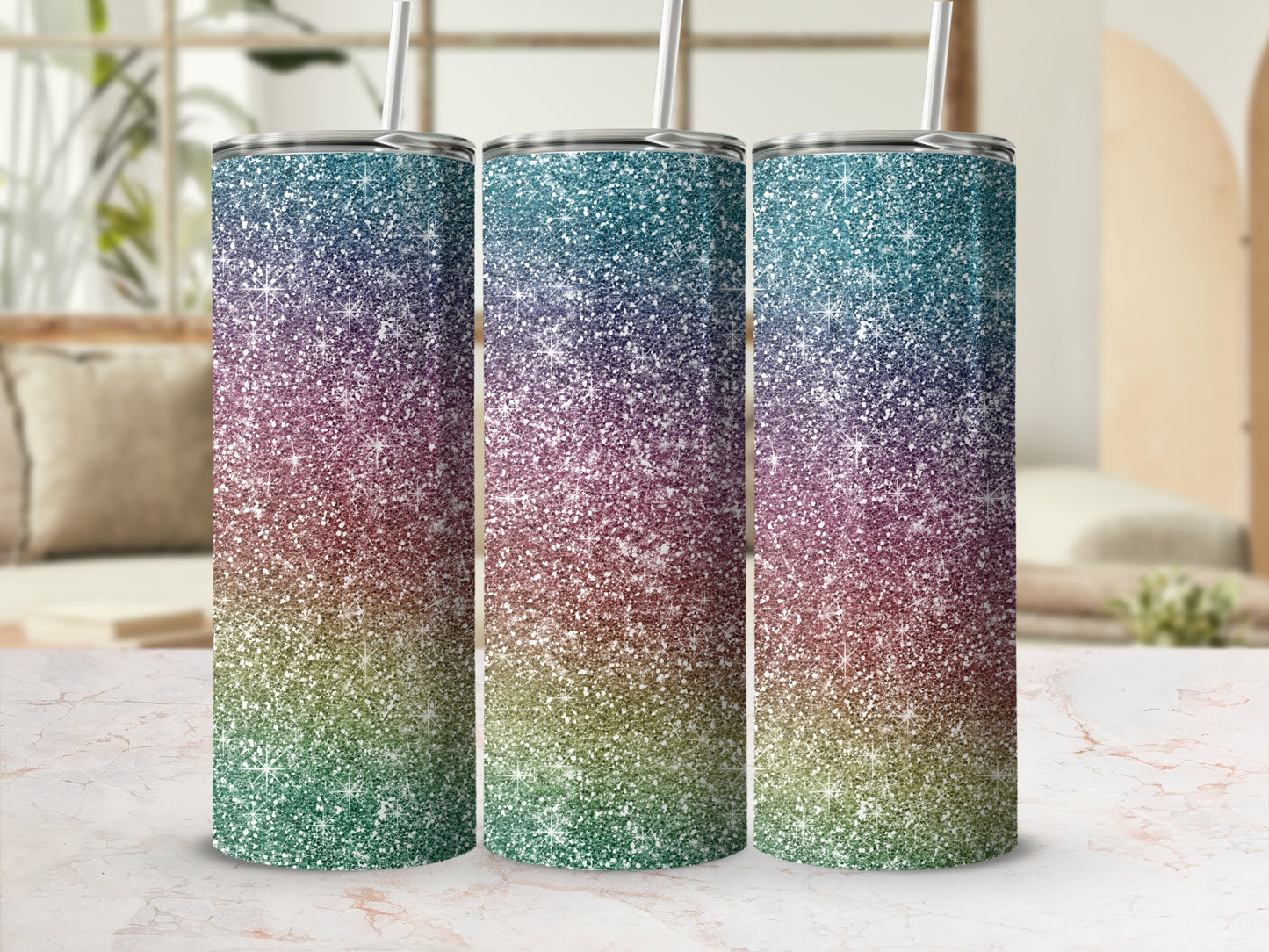 Three tumblers with a glittery gradient from teal to purple to green.