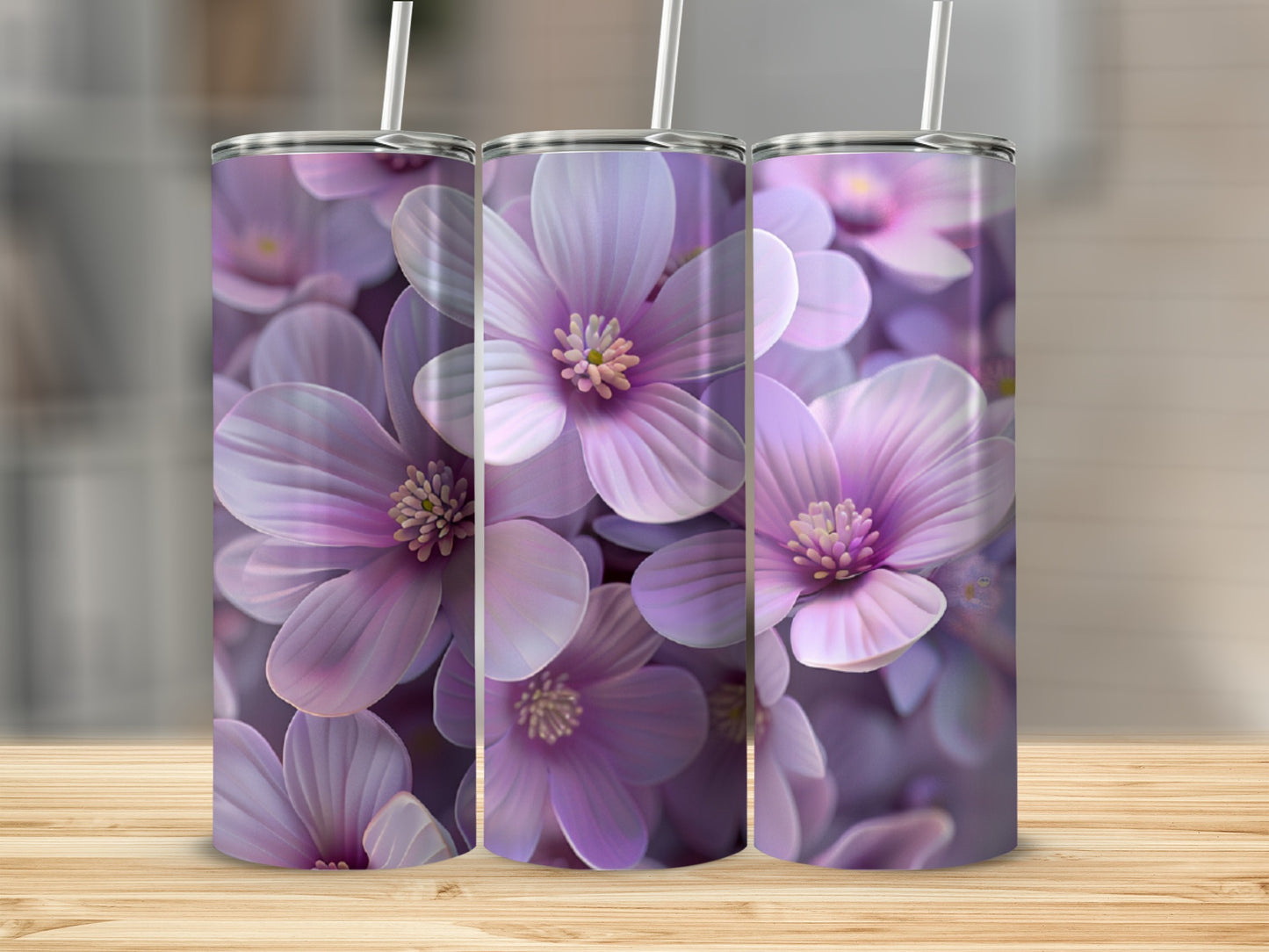 Three tumblers with a close-up floral pattern of purple and pink flowers.