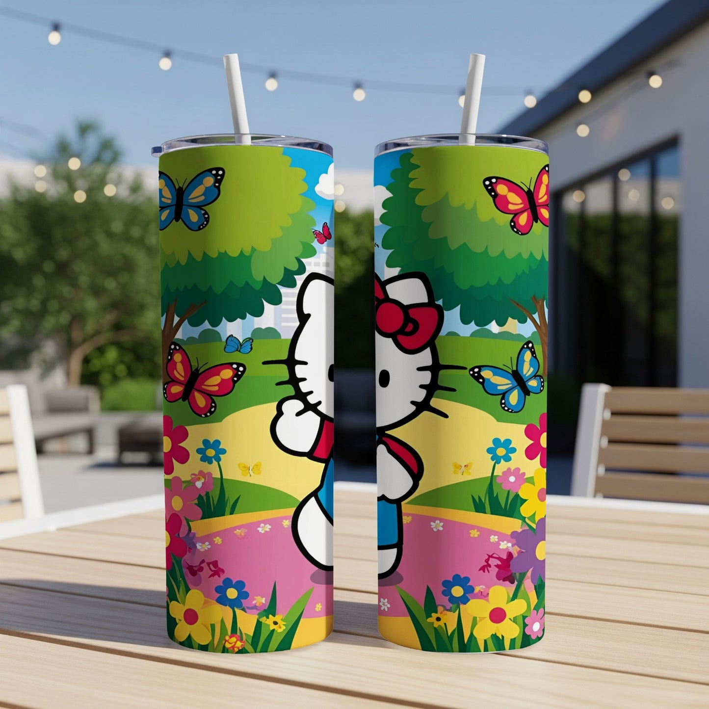 Hello Kitty tumbler with butterflies and flowers, white straw inserted.