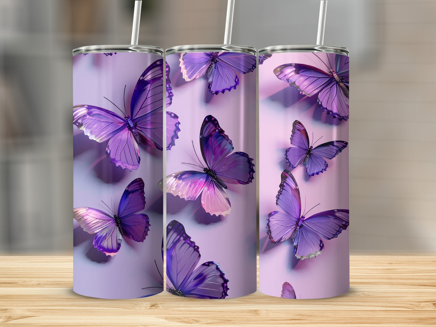 Purple butterflies adorn a tall, slim tumbler with a straw.