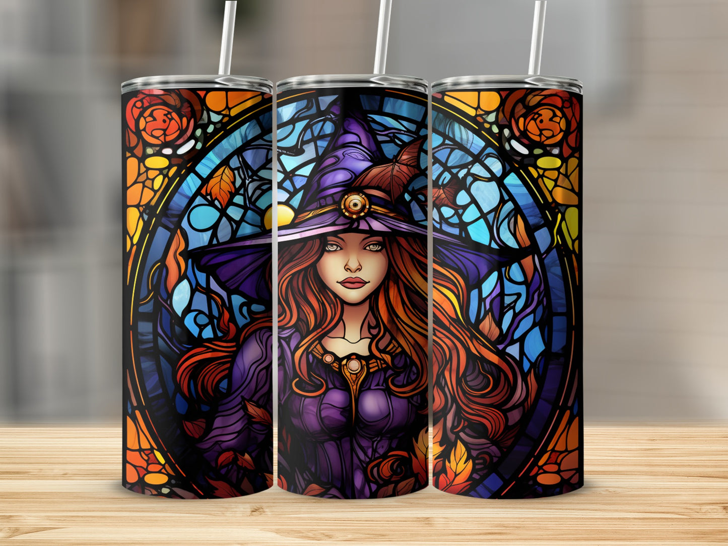Witch in stained glass style on three tumblers with autumnal background.
