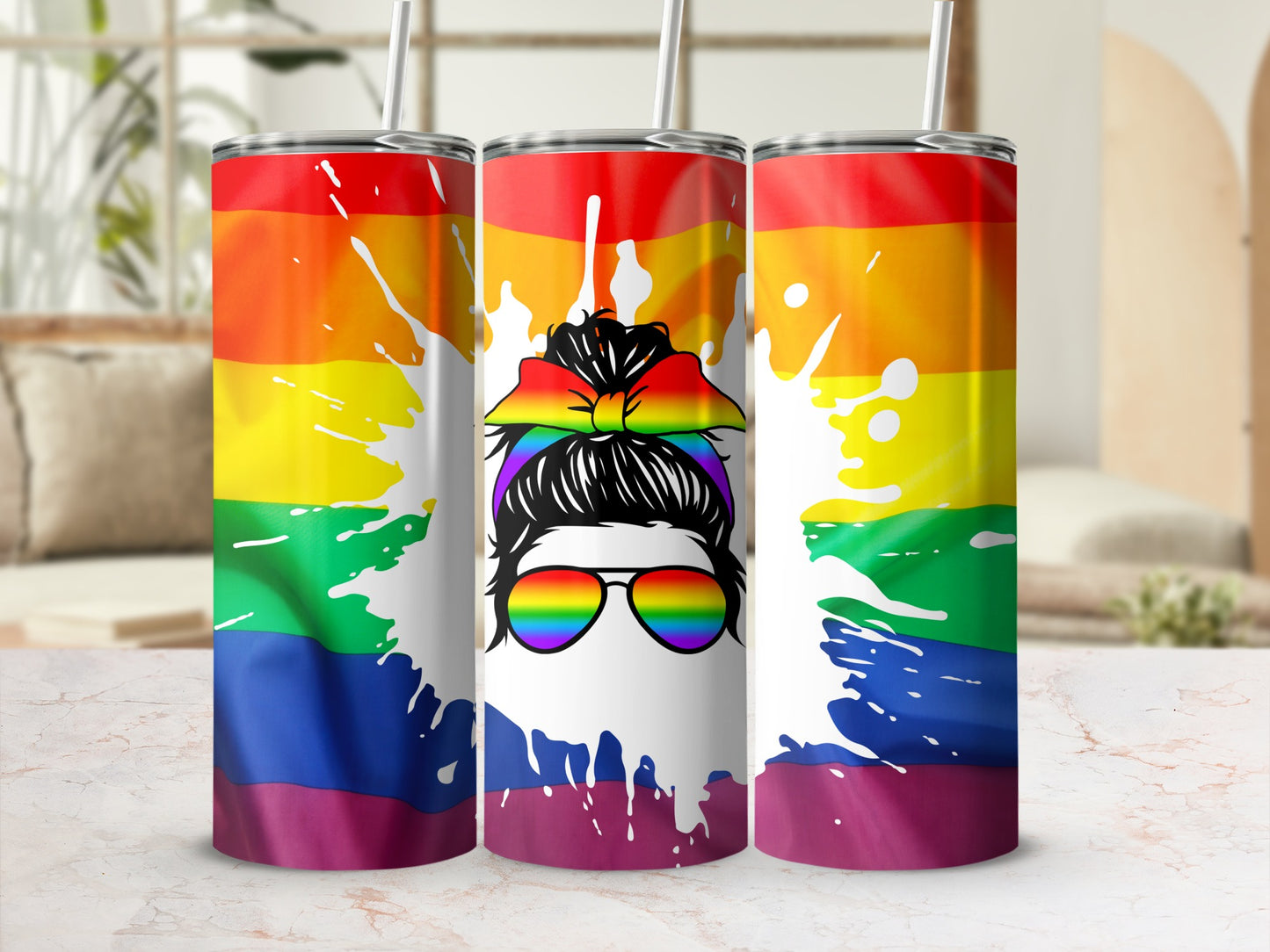 Rainbow tumbler with messy bun woman graphic and sunglasses.