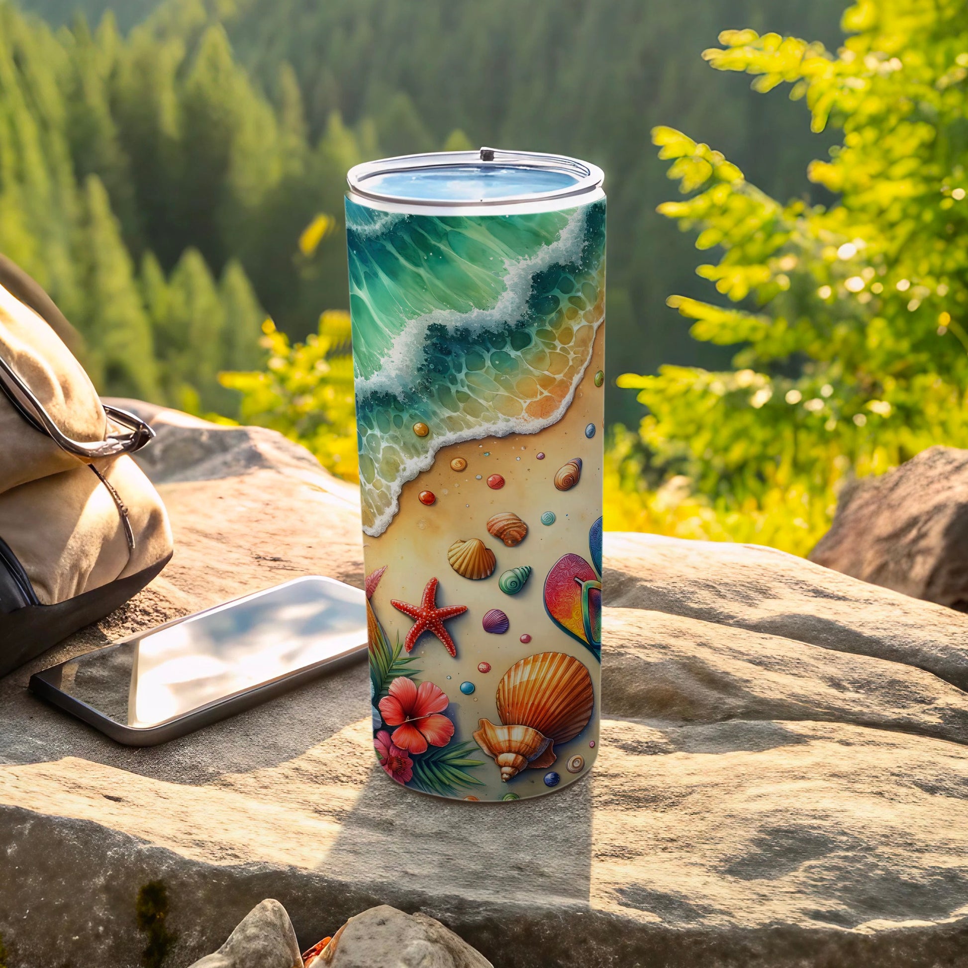 Beach scene tumbler with shells, starfish, and flip-flops on a rock.