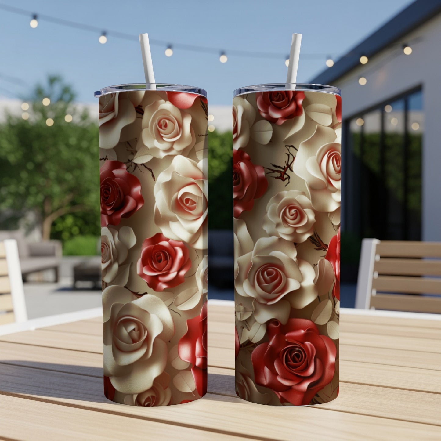 Two tall tumblers with a repeating pattern of red and cream roses.