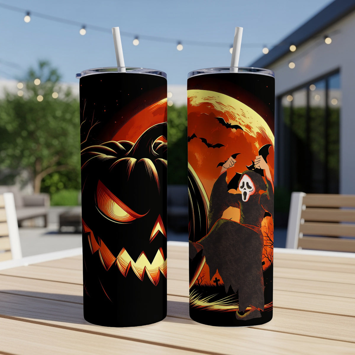 Two Halloween-themed tumblers with a jack-o'-lantern and a ghost figure against a moonlit sky.