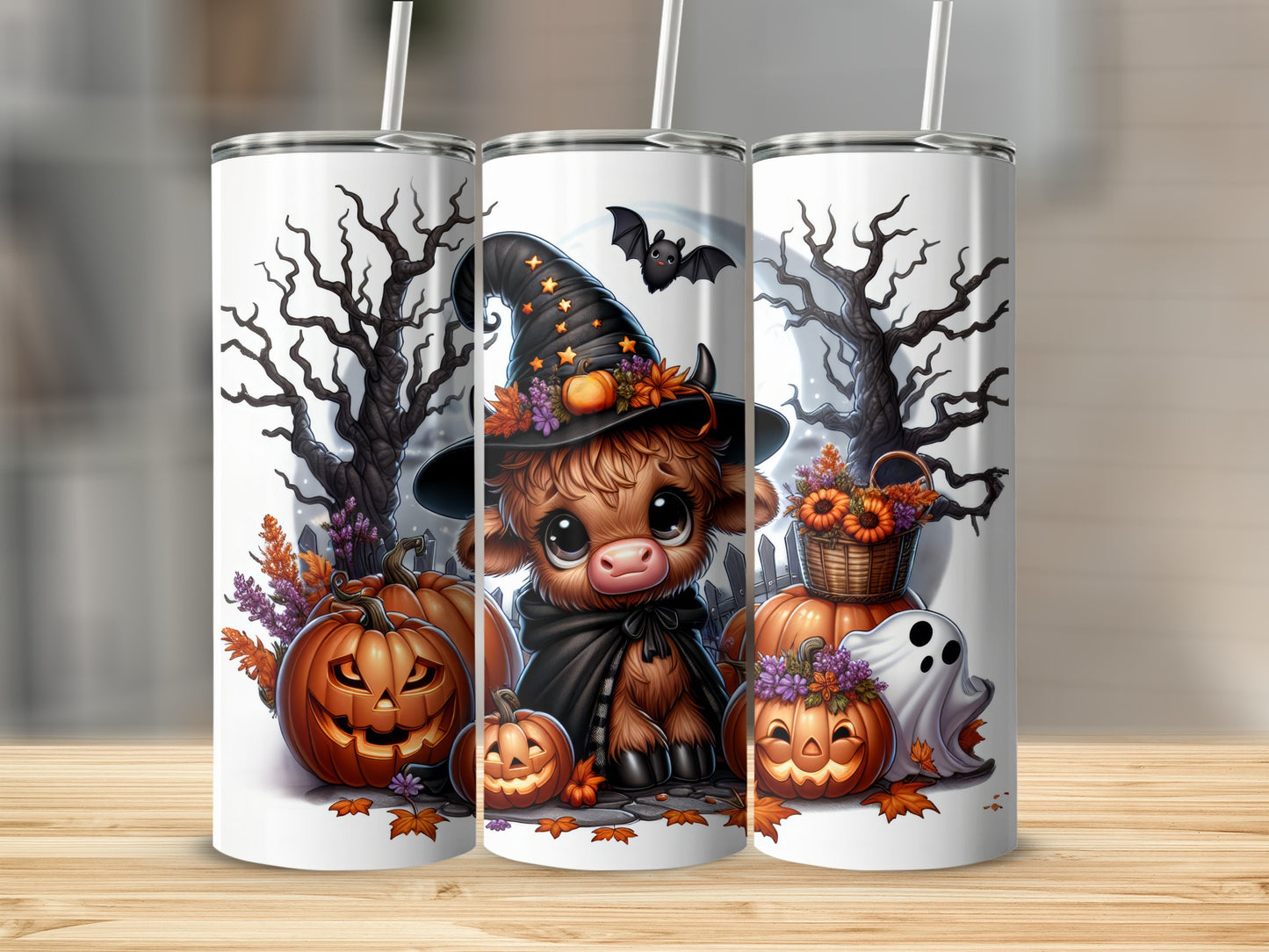 Three Halloween-themed tumblers featuring a cute cow, pumpkins, and a ghost.