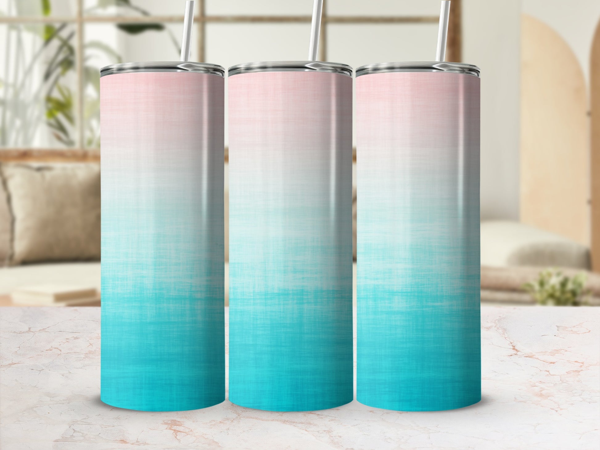 Three tumblers with pink and teal ombre gradient design.