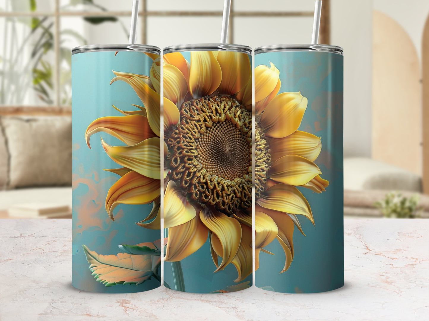 Three tall tumblers with a large sunflower design on a marble surface.