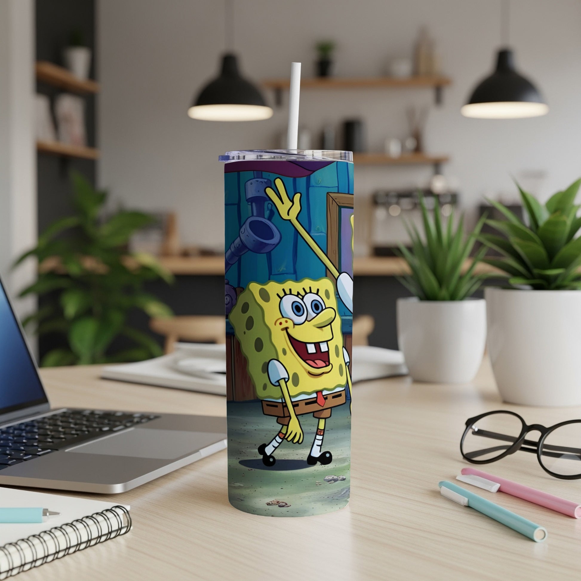 SpongeBob SquarePants character printed on a white tumbler with a straw.