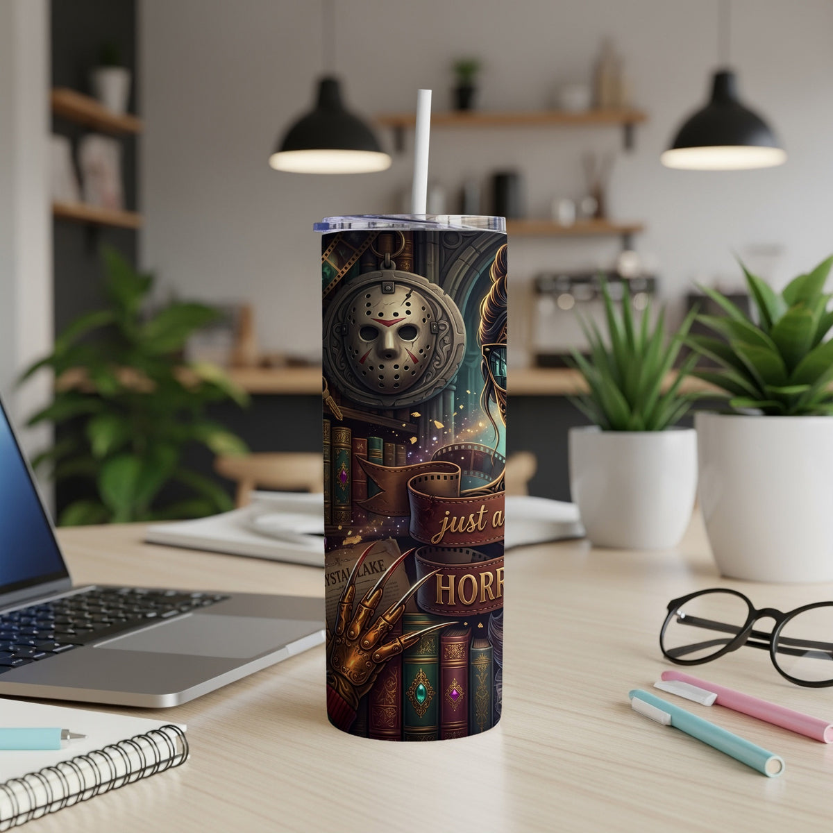 Horror-themed tumbler with Jason mask, clawed glove, and "just a horror" text.