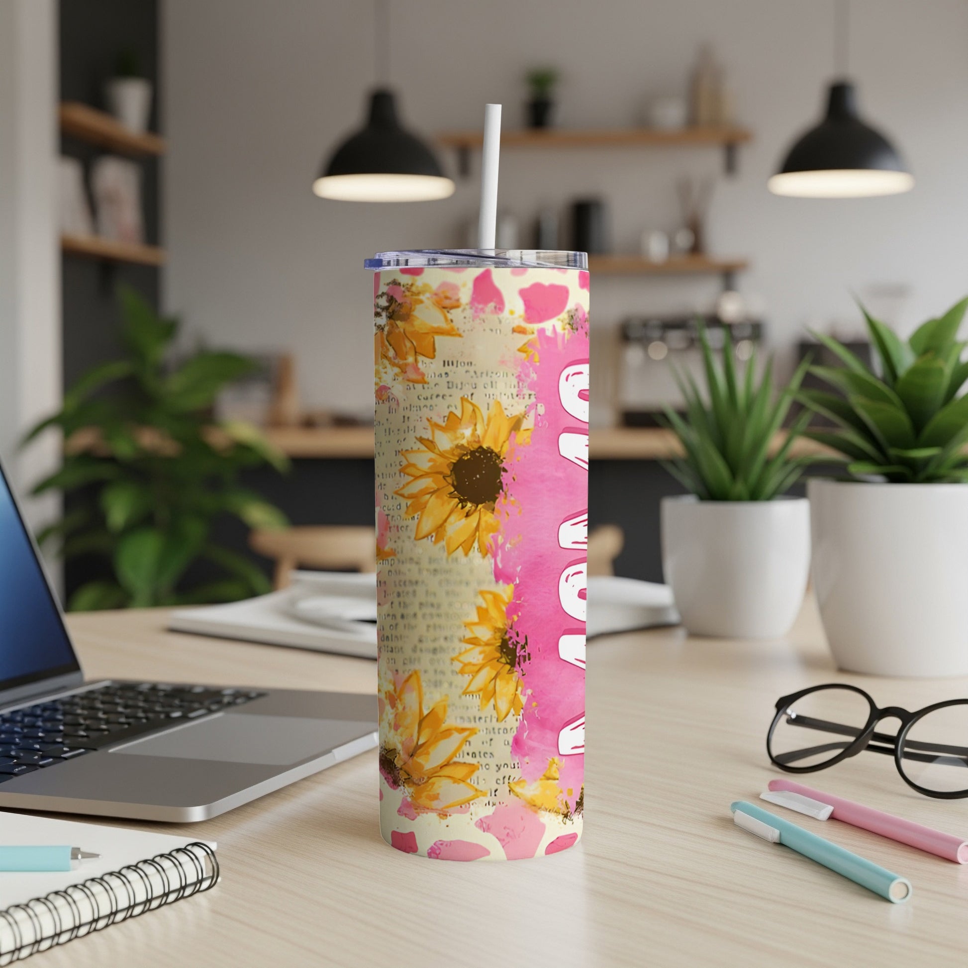Pink tumbler with sunflower pattern and "Mama" text.