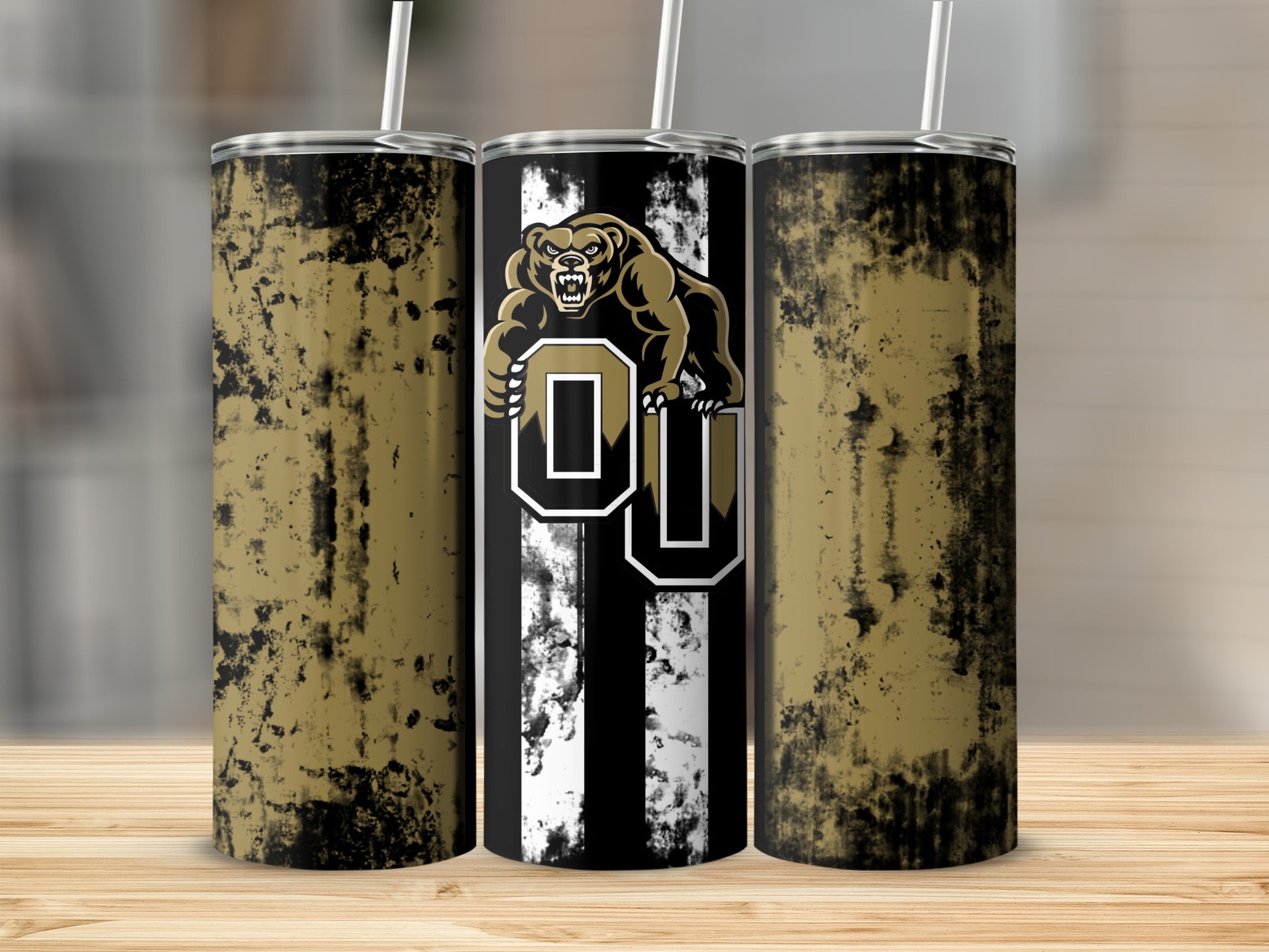 Tumblers with bear and OU logo design on black and white stripes.