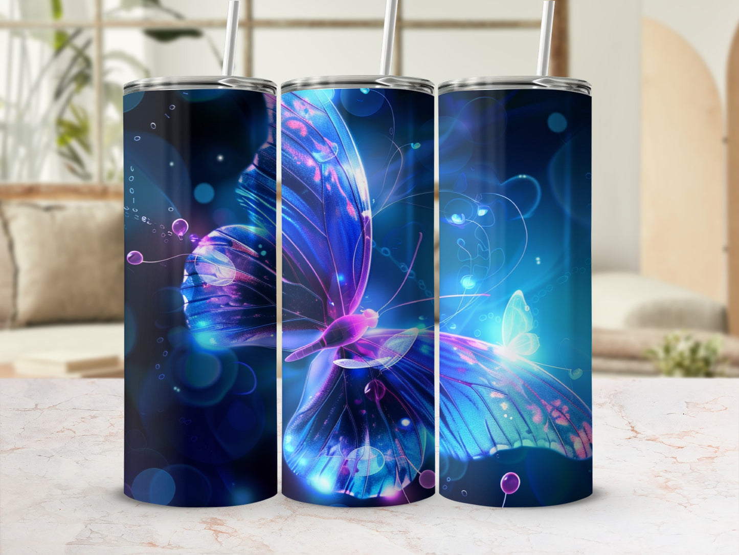 Three tumblers with a glowing blue and purple butterfly design.