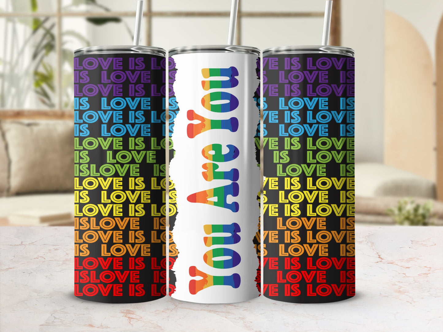 Tumbler with rainbow "You Are You" text and repeated "Love Is Love" pattern.