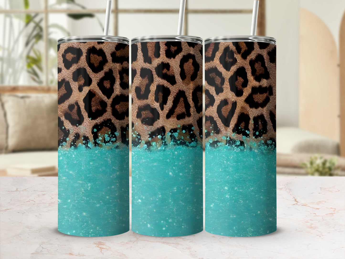 Leopard print tumbler with blue glitter accent and straw.