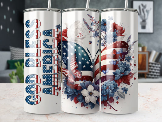 Tumbler with "God Bless America" and patriotic floral butterfly design.