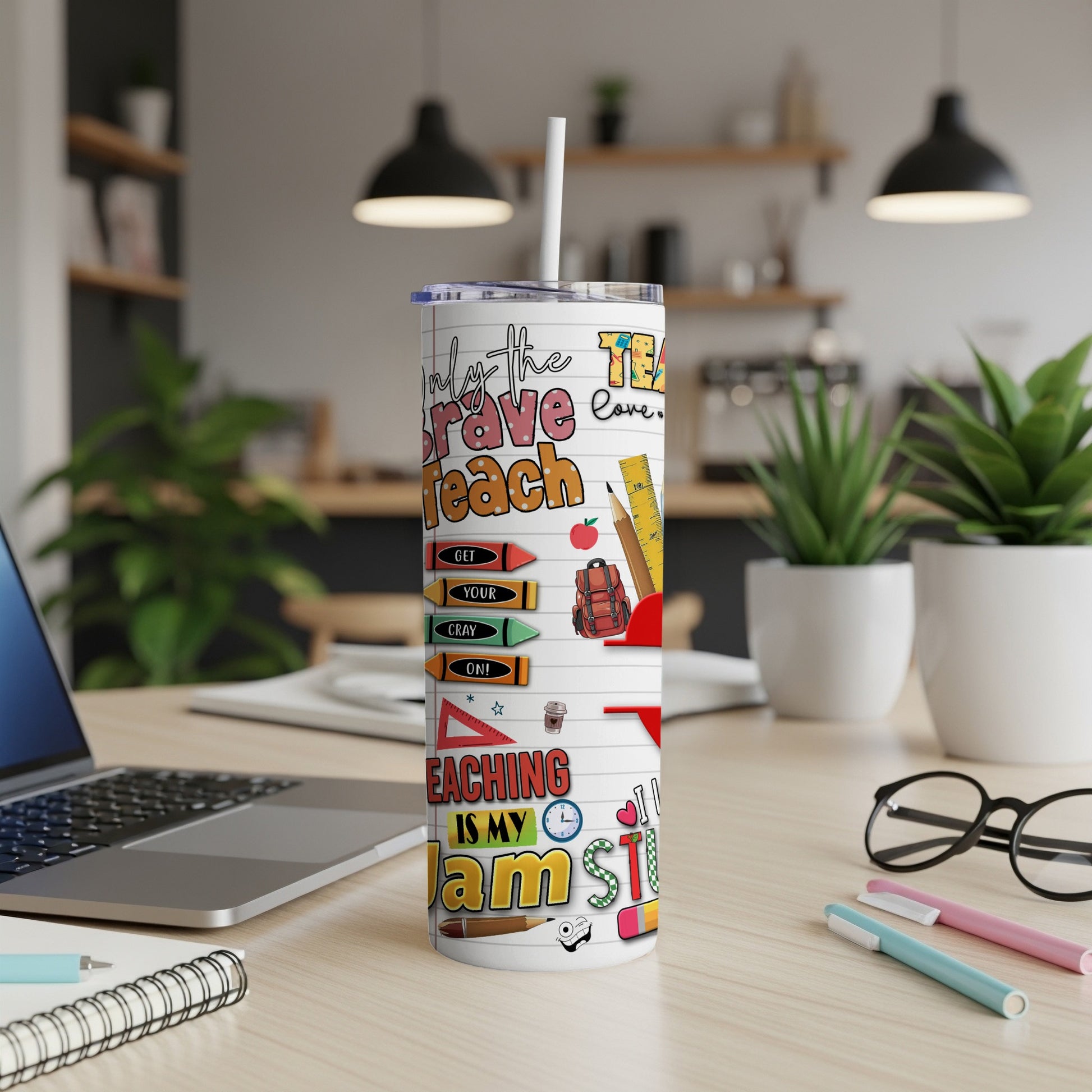 Teacher tumbler with "Teach is my Jam" and school supply graphics.