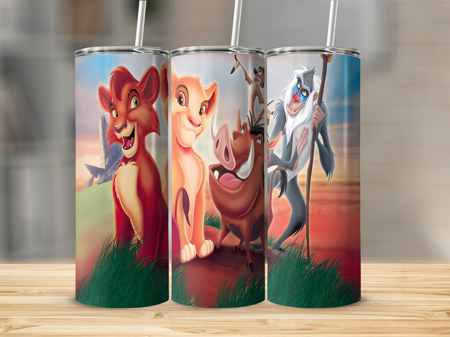 The Lion King characters Simba, Nala, Timon, and Pumbaa on a tumbler.
