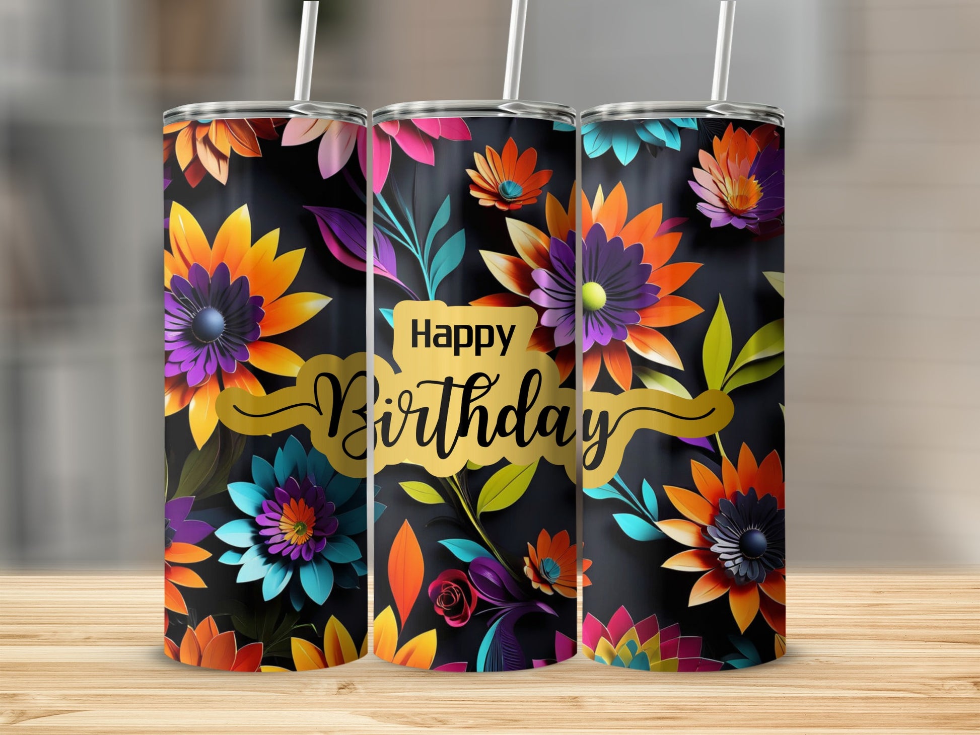 Three tumblers with colorful floral designs and "Happy Birthday" text.
