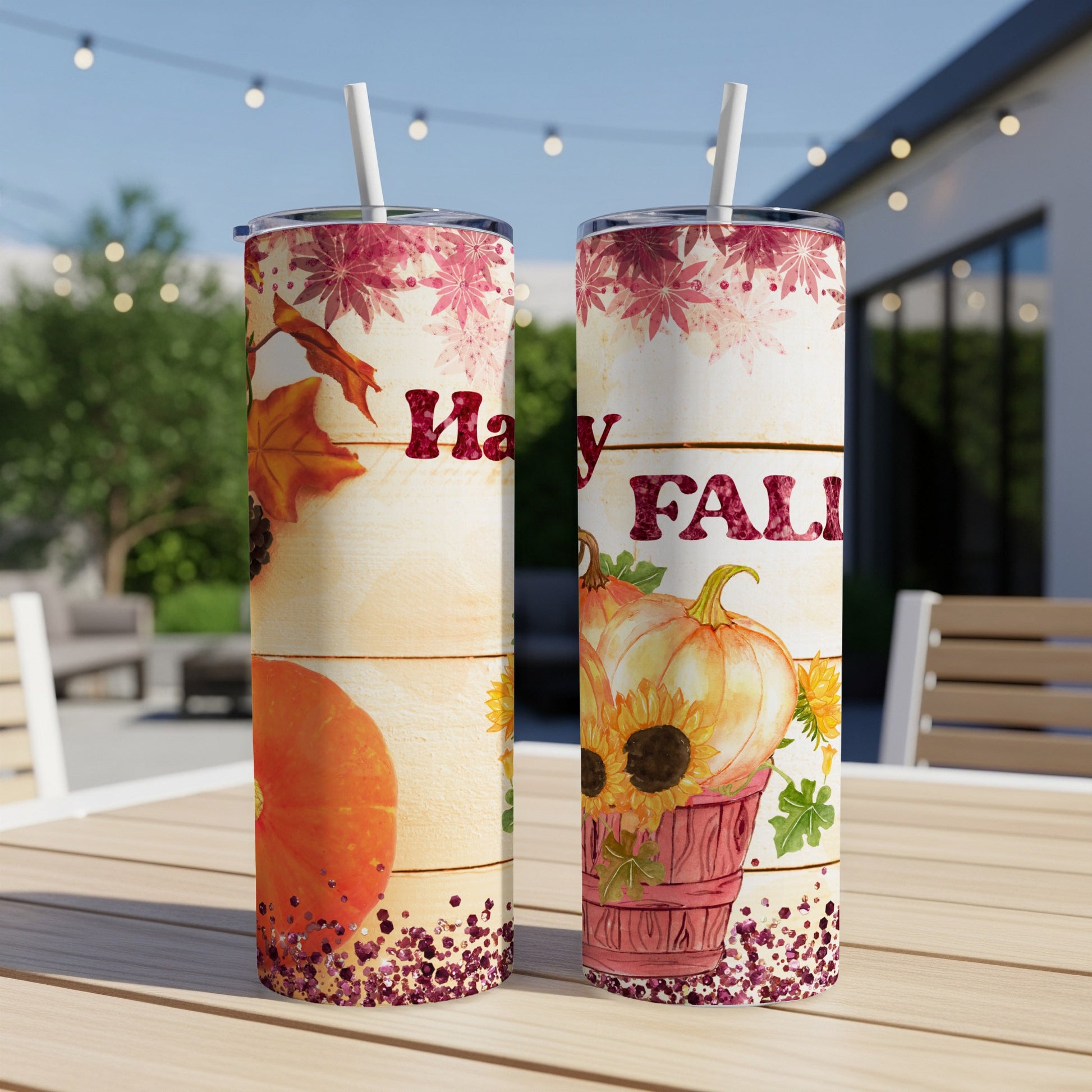 Two tumblers with "Happy Fall" text, pumpkins, sunflowers, and autumn leaves.
