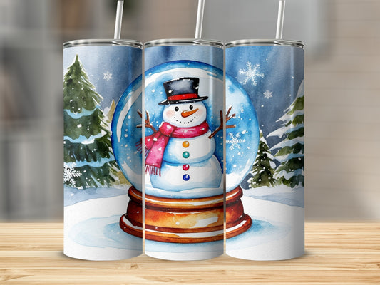 Snow globe with snowman, trees, and snowflakes, on a wooden surface.