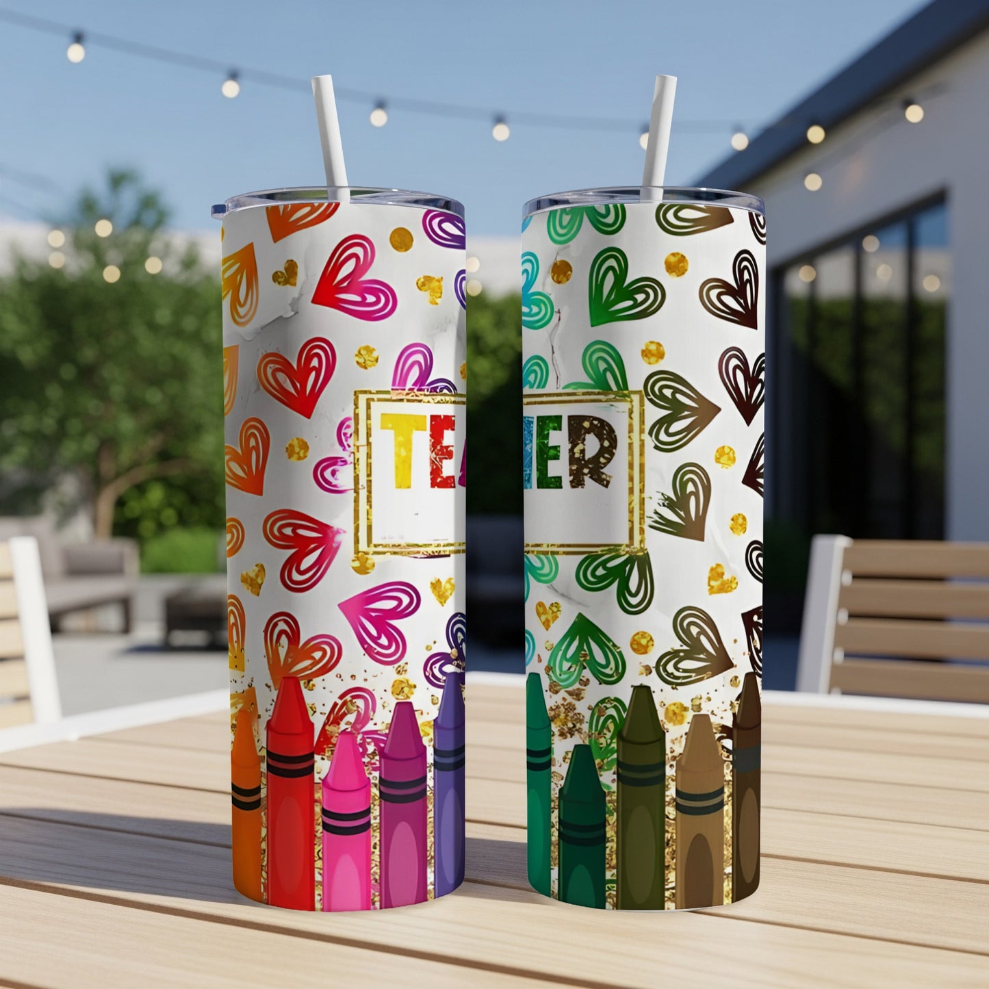 Two tumblers with crayon and heart designs, one reading "TEACHER".