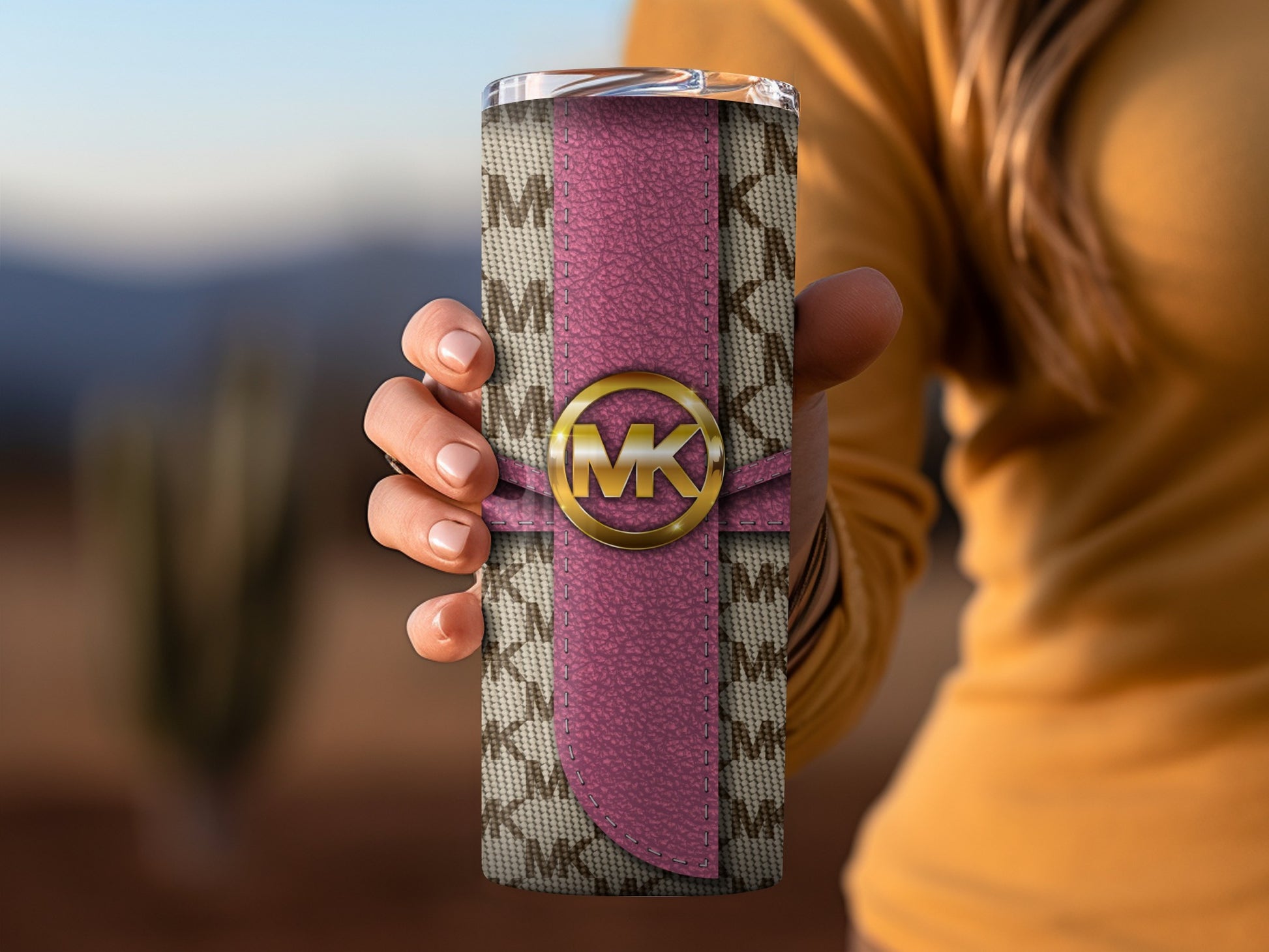 Stylish pink and brown embossed MK tumbler product
