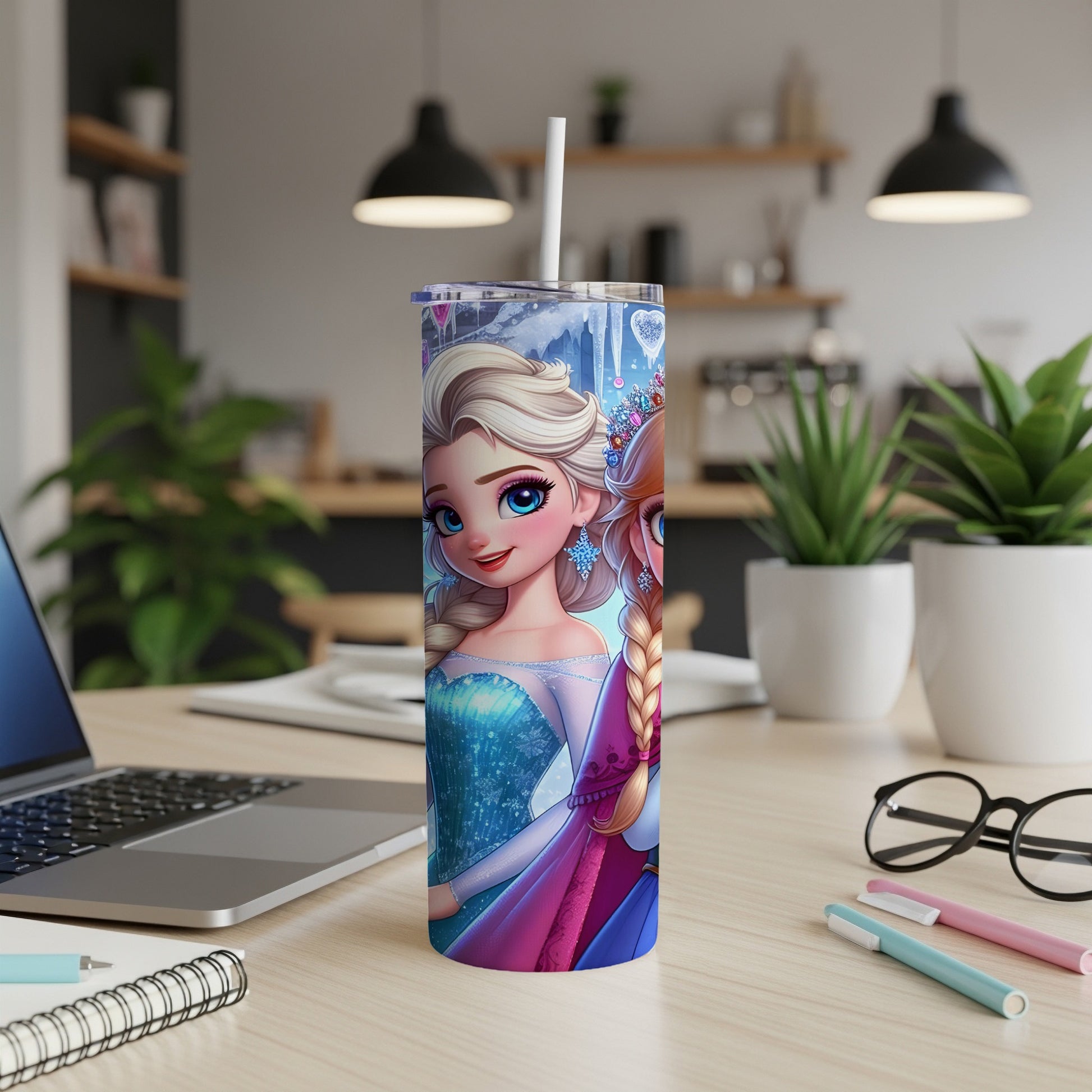 Disney's Elsa and Anna characters on a white tumbler with a straw.