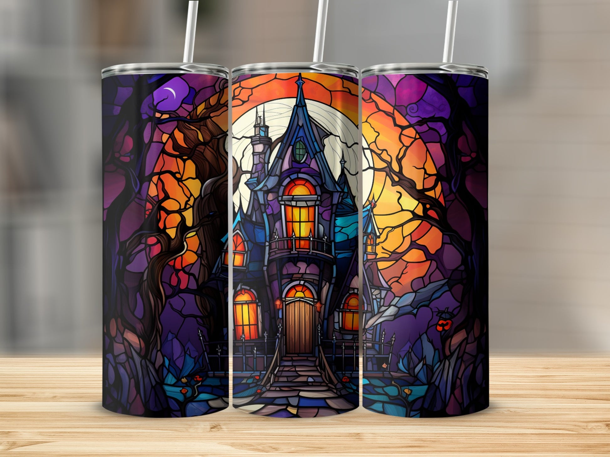 Stained glass tumbler design of a haunted house at sunset with a large moon.