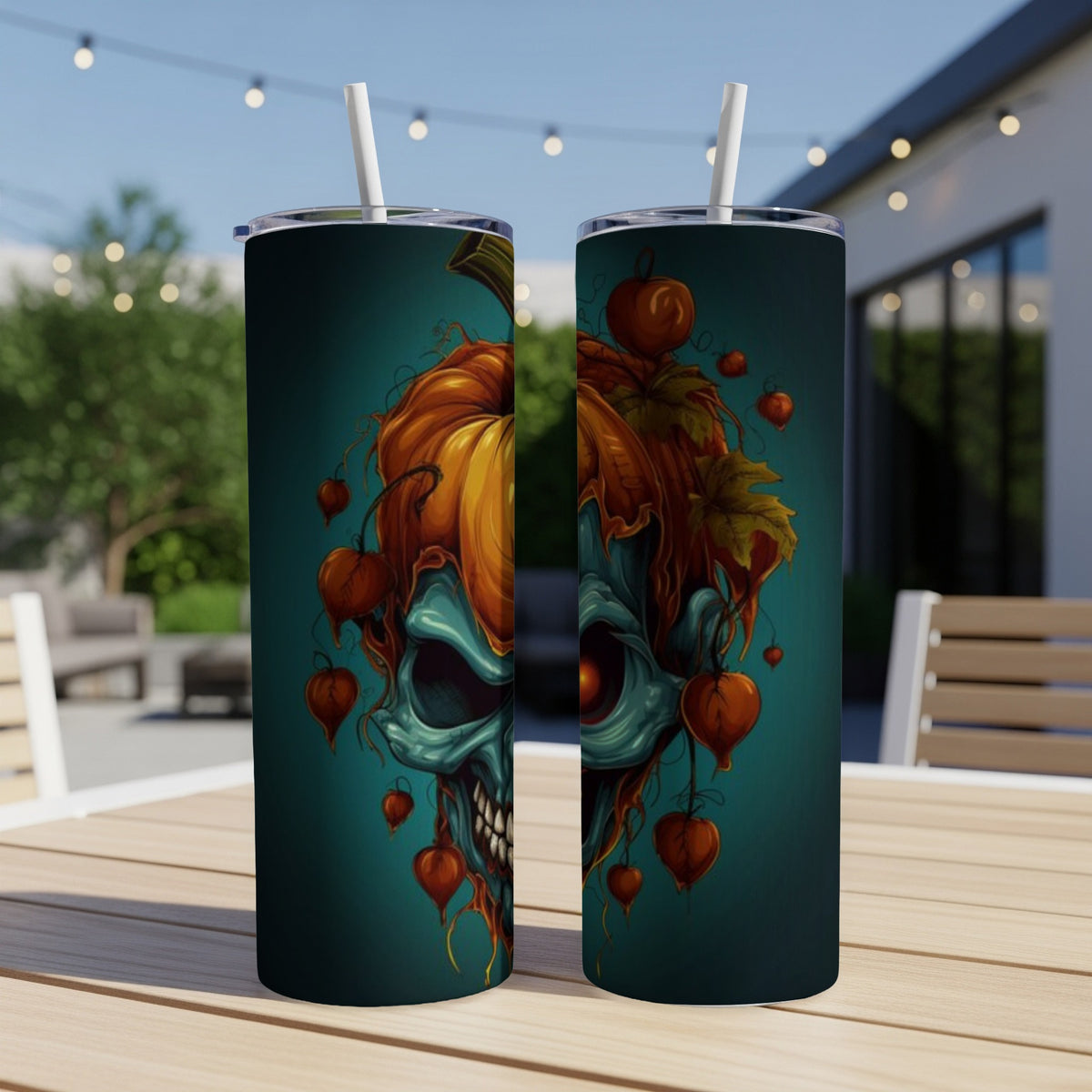 Tumbler with teal skull and pumpkin Halloween design with hanging Chinese lanterns.