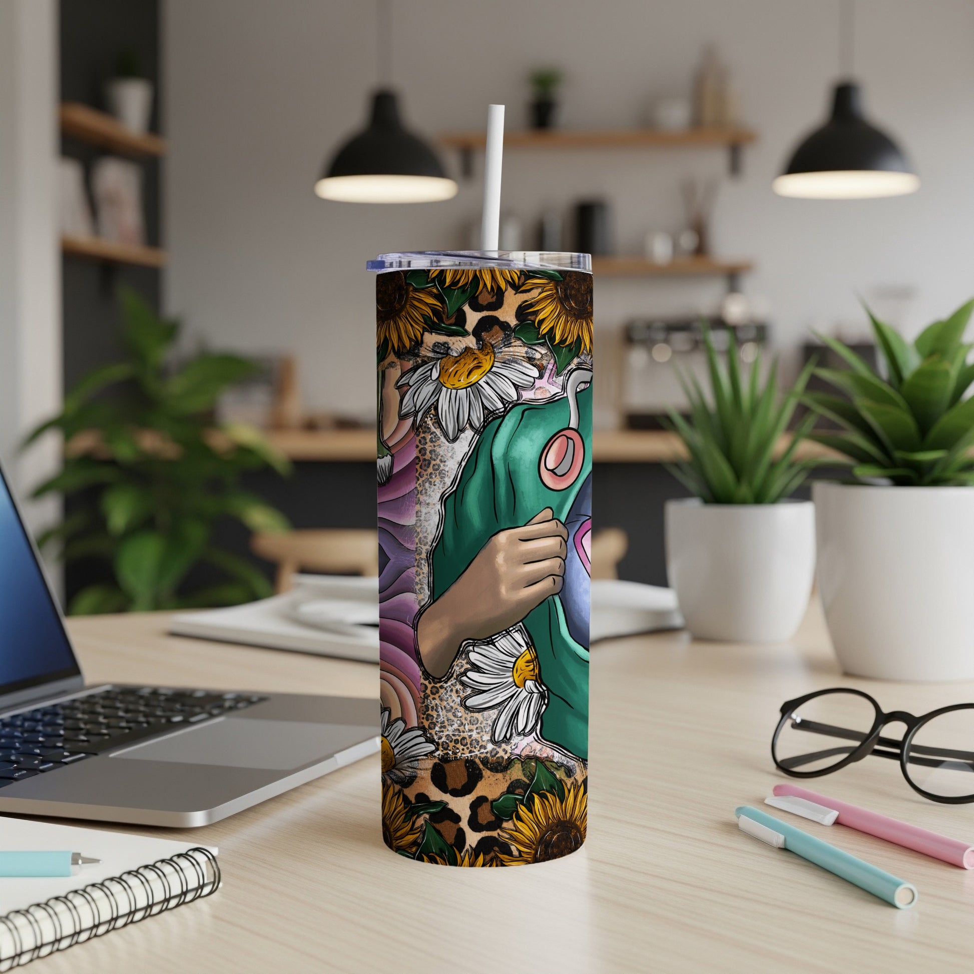 Tumbler with sunflowers, leopard print, and abstract design featuring a hand.
