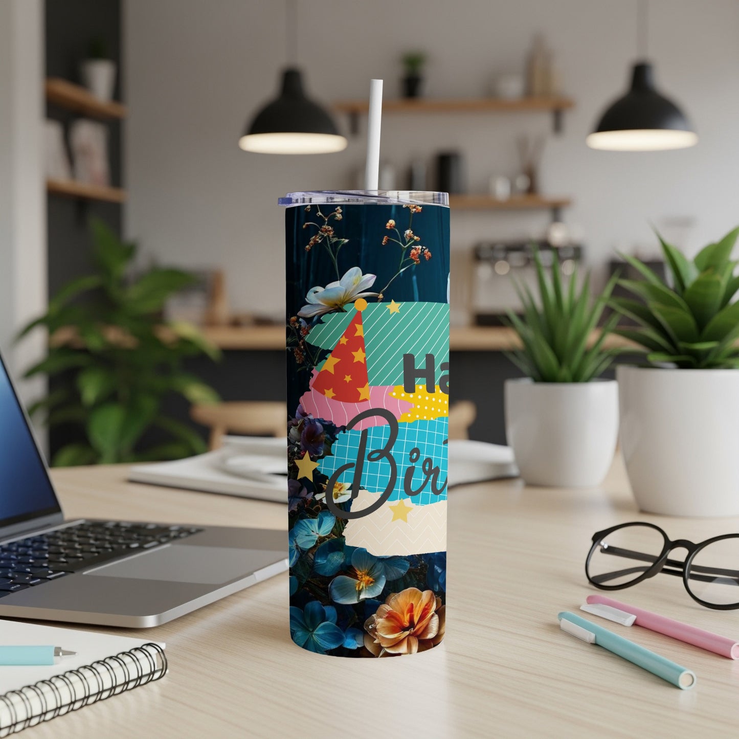 Tumbler with "Happy Birthday" text, birthday hat, and floral designs.