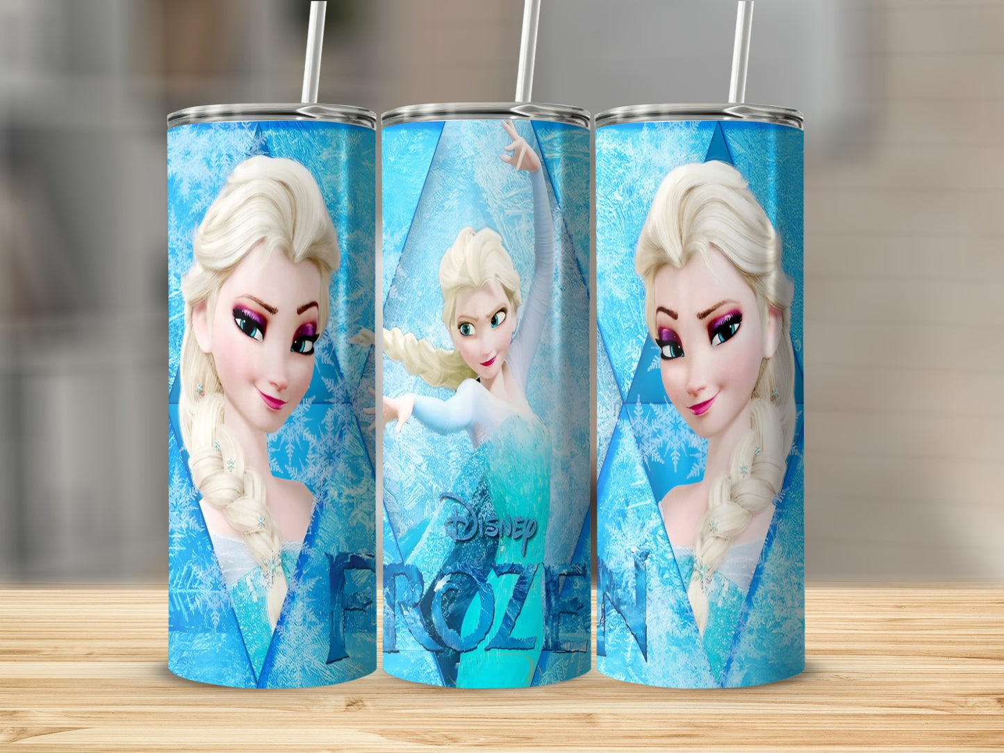 Three tumblers featuring Elsa from Disney's Frozen, with snowflakes.