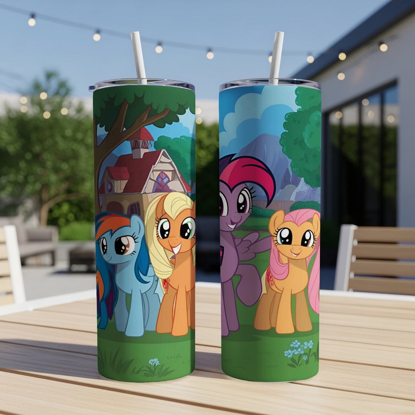Two My Little Pony tumblers with Twilight Sparkle, Rainbow Dash, and Fluttershy on a patio table.