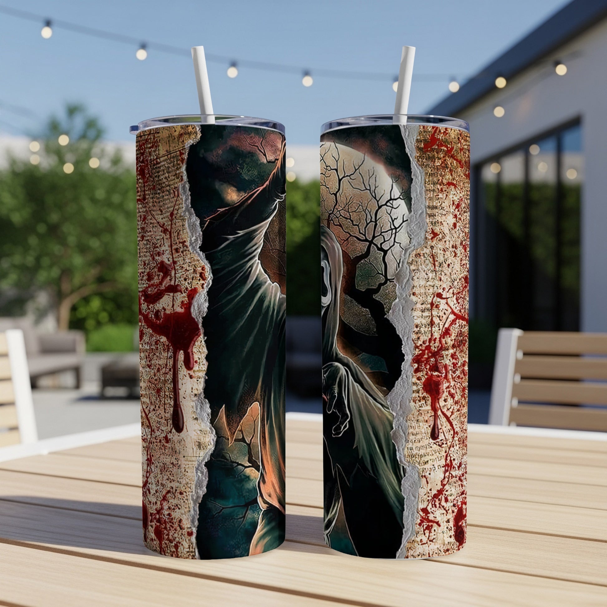 Two tumblers with a ripped paper, spooky ghost, and blood splatter design.