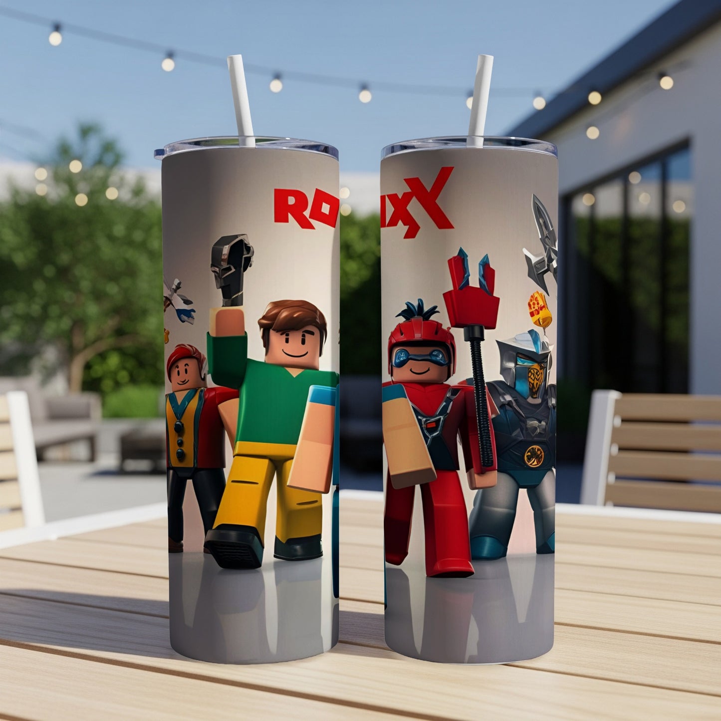 Two Roblox character tumblers with straws sit on a table.