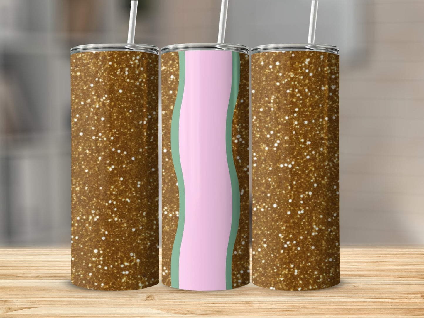 Glitter tumbler with pink and green wavy design on white background.