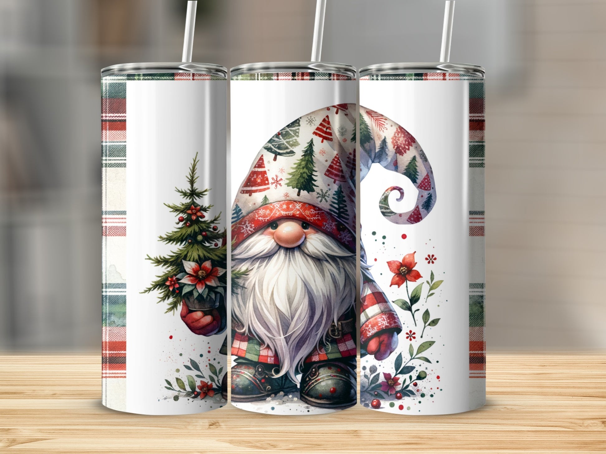 Three tumblers featuring a gnome holding a Christmas tree, with plaid patterns.